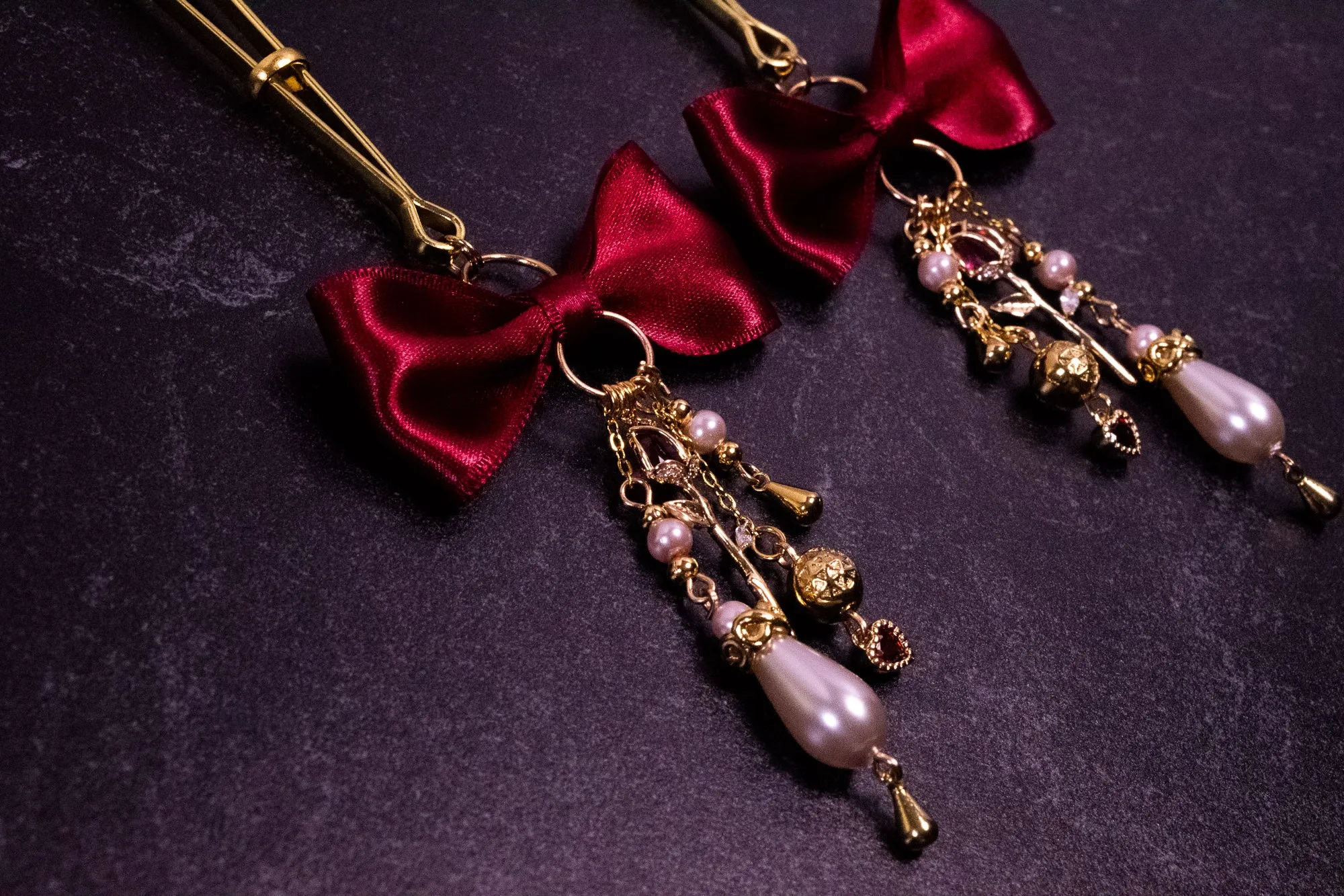 Deluxe Red Bow Tweezer Nipple Clamps in Gold