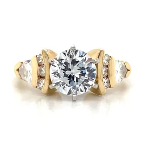 Side Stone Graduating Engagement Ring in 14K Yellow Gold